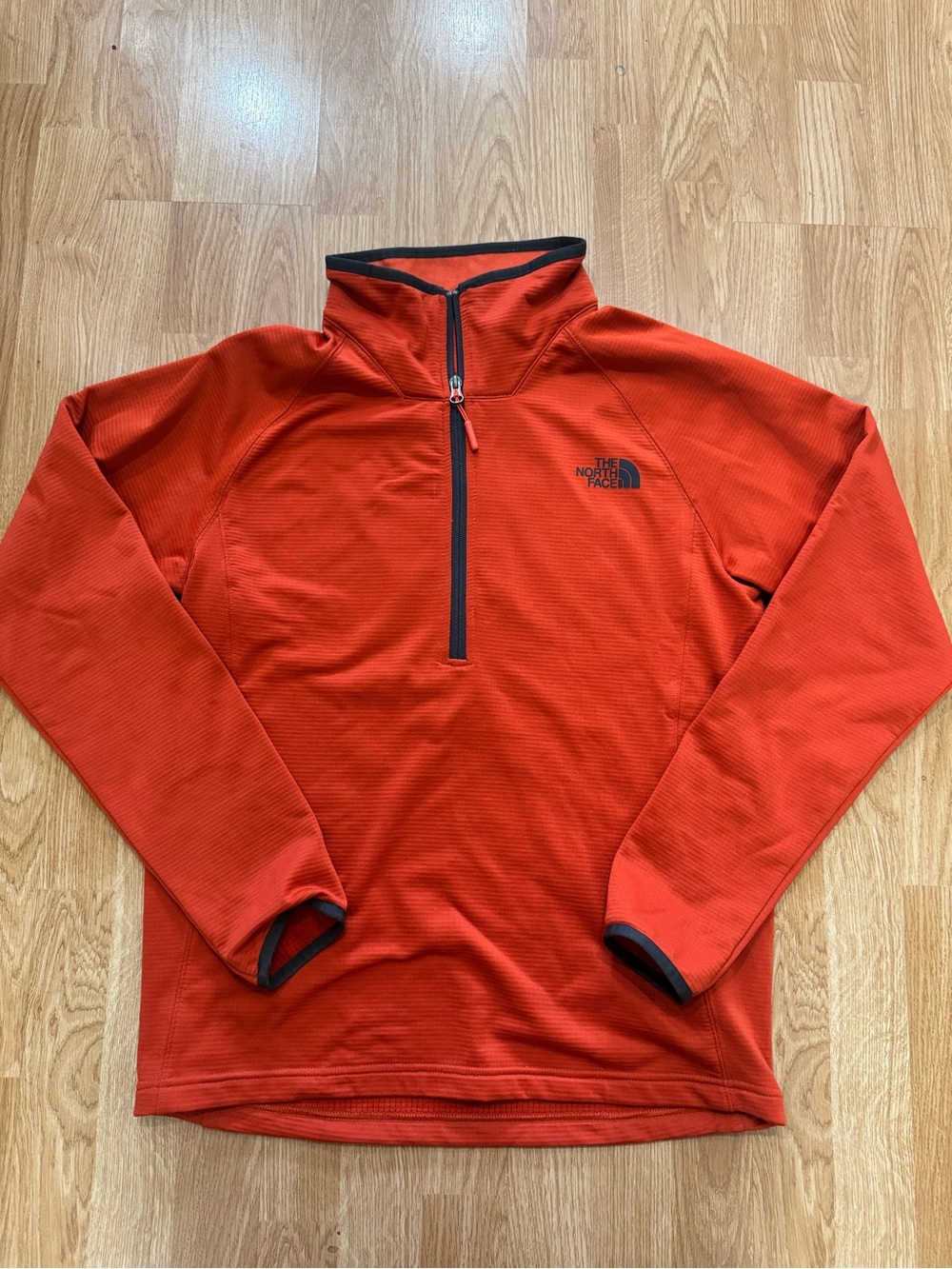 The North Face Men’s Half-Zip Jacket in burnt orange